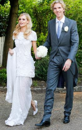 Poppy and her husband on their wedding day